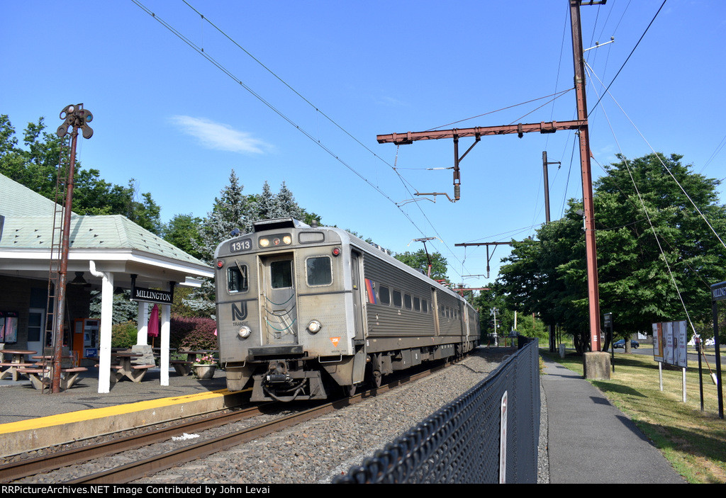 NJT Train # 427 arriving into the Millington Station with the out of service semaphore on the left